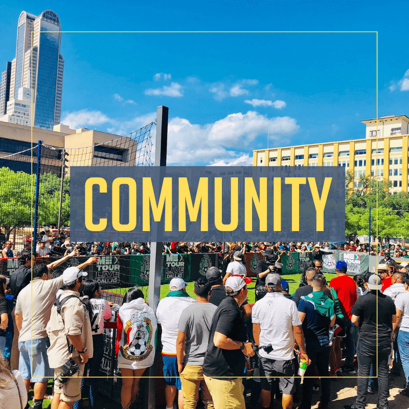 a crowd of people surrounding an urban soccer park